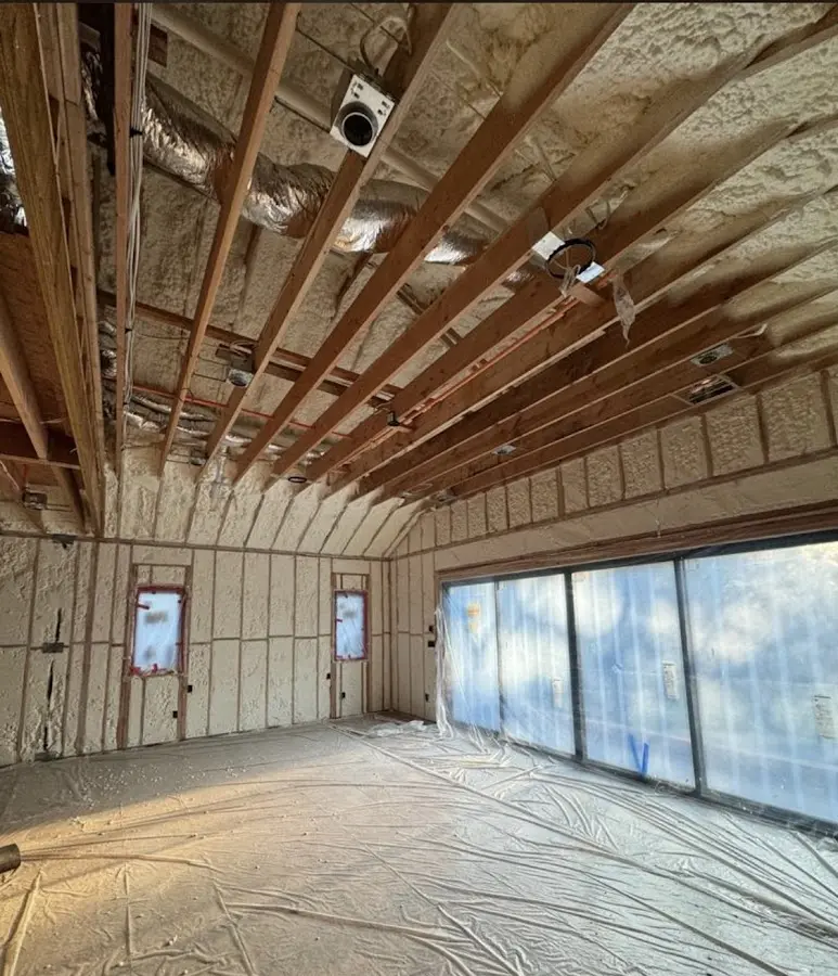 Interior walls and ceiling insulated with spray foam during new construction in River Falls